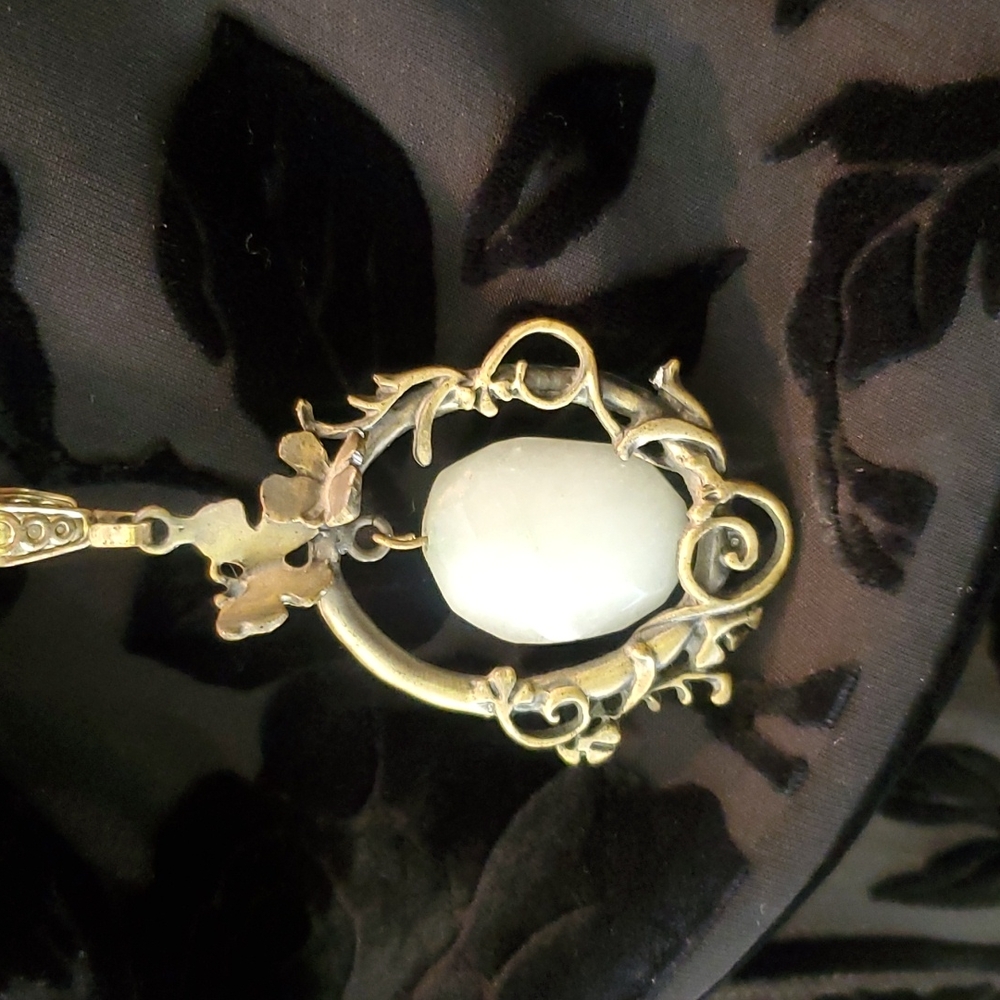Vintage necklace, tiny butterflies in antique gold surround natural polish stone
